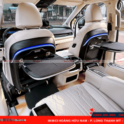 Ghế Limousine cho xe Carnival tích hợp bàn làm việc ở ghế hàng hai